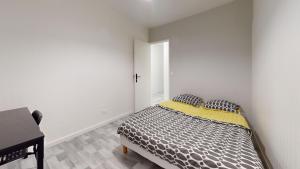 Posteľ alebo postele v izbe v ubytovaní Grand appartement lumineux