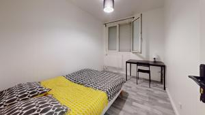 Posteľ alebo postele v izbe v ubytovaní Grand appartement lumineux