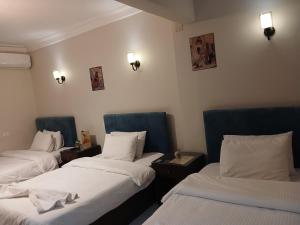 Katil atau katil-katil dalam bilik di Pyramids Way Inn