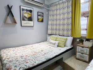 Voodi või voodid majutusasutuse AMU Dreamhouse 阿木旅舍 toas