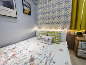 Voodi või voodid majutusasutuse AMU Dreamhouse 阿木旅舍 toas