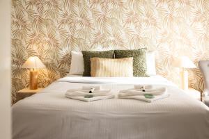 Barossa Palms Motel客房内的一张或多张床位