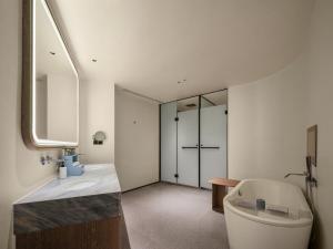 Koupelna v ubytování Aden Hotel Shenzhen Nanshan