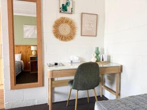Barossa Palms Motel客房内的一张或多张床位