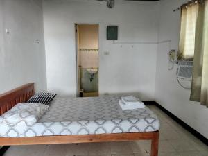 Postel nebo postele na pokoji v ubytování A place to stay in Cebu City