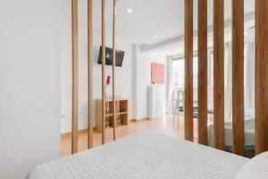 Ένα ή περισσότερα κρεβάτια σε δωμάτιο στο Estudio Sonia +13 φωτογραφίες