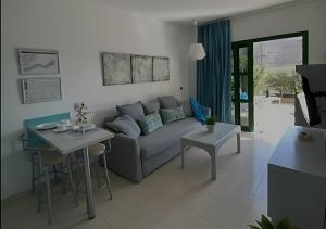 Χώρος καθιστικού στο VELEROS SUNSET Puerto Rico Apartement