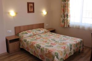 Postel nebo postele na pokoji v ubytování Hotel Radik