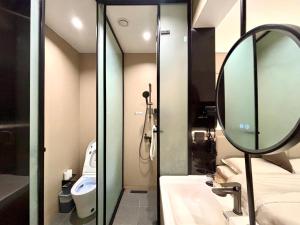 Ένα μπάνιο στο Yijia Hotel -Jiefangbei Hongya Cave