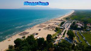 an aerial view of a beach and the ocean at Budget Family House in Mirodháton +2 photos