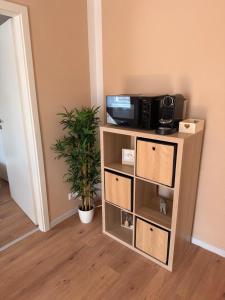 Η κουζίνα ή μικρή κουζίνα στο Appartement 2a - Gemütliche Wohnung mit Küchenzeile, Bad und Balkon +4 φωτογραφίες
