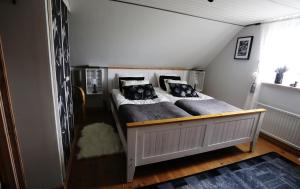 Postel nebo postele na pokoji v ubytování B&B Hannåsa Gård