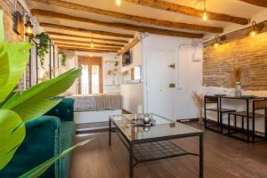 Posezení v ubytování De Época Apartment