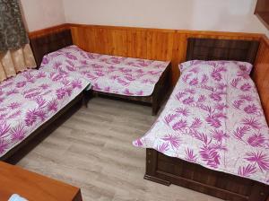 Postel nebo postele na pokoji v ubytování Guest house Family
