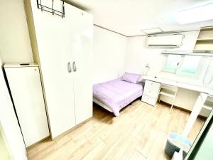 Postel nebo postele na pokoji v ubytování One Room Goshiwon