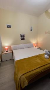 Кровать или кровати в номере Apartamento VUT La Escuela El Barco de Ávila