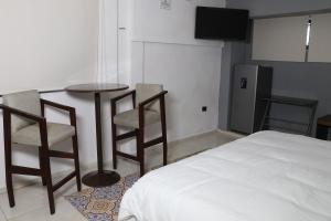 Postel nebo postele na pokoji v ubytování Apartamentos 31