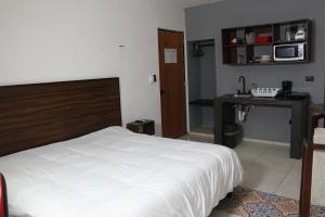 Kuchyň nebo kuchyňský kout v ubytování Apartamentos 31