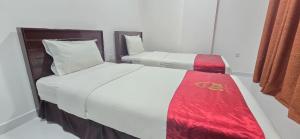 Postel nebo postele na pokoji v ubytování Star Suites