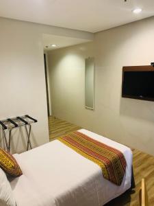 TV a/nebo společenská místnost v ubytování The Lanang Suites
