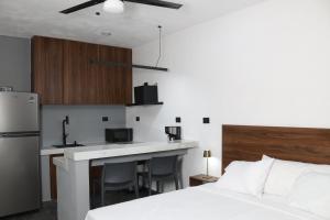 Postel nebo postele na pokoji v ubytování Apartamentos 31