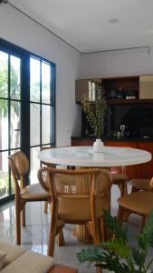 a dining room with a table and chairs at Pandan Villas, Canggu in Dalung