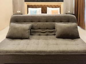 Posezení v ubytování Giri Palma Hotel and Villas RedPartner at Tidar Malang + 21 fotografií