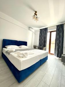 Postel nebo postele na pokoji v ubytování Luxury by SARAY