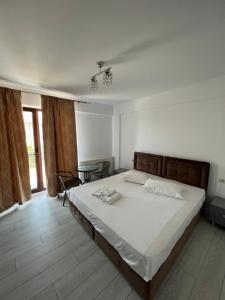 Postel nebo postele na pokoji v ubytování Luxury by SARAY