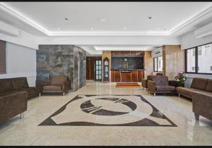 Posezení v ubytování Raajpath Hotel Vadodara