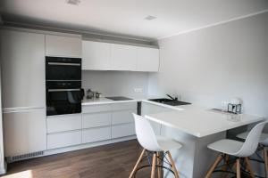 Kuchyň nebo kuchyňský kout v ubytování Pärnu Lubja Apartments