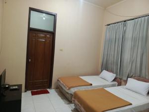 Gallery image of Hotel Handayani in Kepandean +10 photos