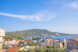 a view of a town and the water at House Matilda in Primošten