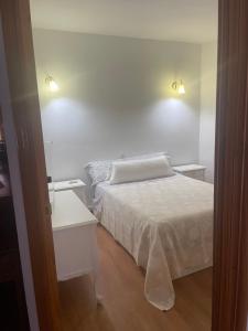 Posteľ alebo postele v izbe v ubytovaní Hostal Casa López