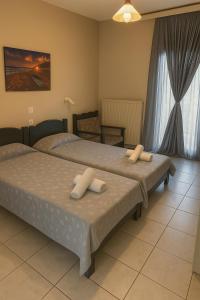 Postel nebo postele na pokoji v ubytování Royal Club Hotel - Aqua Poolside Bliss