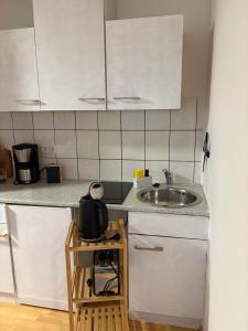 Kuchyň nebo kuchyňský kout v ubytování Appartementshaus Vlora 2 App 7