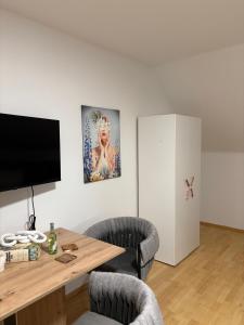 TV a/nebo společenská místnost v ubytování Appartementshaus Vlora 2 App 7