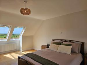 Giường trong phòng chung tại Fiáin Retreat