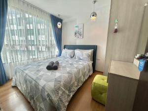 Postel nebo postele na pokoji v ubytování Centrio 2 Bedrooms Condos in Town-Central Phuket + 25 fotografií