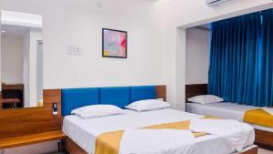 Postel nebo postele na pokoji v ubytování Hotel Top Point
