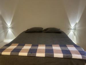 En eller flere senge i et værelse på Residence 50 Apartment Nausori