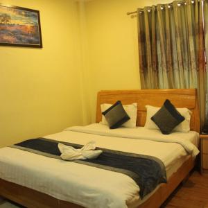 Postel nebo postele na pokoji v ubytování Swan Hotel