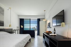 Letto o letti in una camera di Almyra