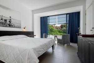 Letto o letti in una camera di Almyra
