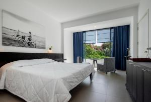 Letto o letti in una camera di Almyra