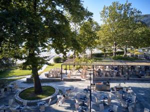 an overhead view of a patio with tables and chairs at Makryammos in Limenas