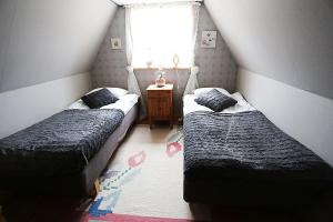 Postel nebo postele na pokoji v ubytování B&B Hannåsa Gård