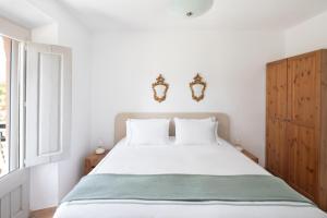 Postel nebo postele na pokoji v ubytování Hotel Dosterras