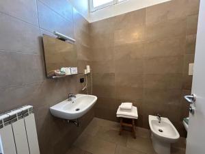 Koupelna v ubytování Albergo Salerno