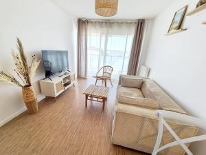Posezení v ubytování ParcAppart 306 Booking